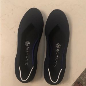 Rothy's navy round toe flats. 7.5